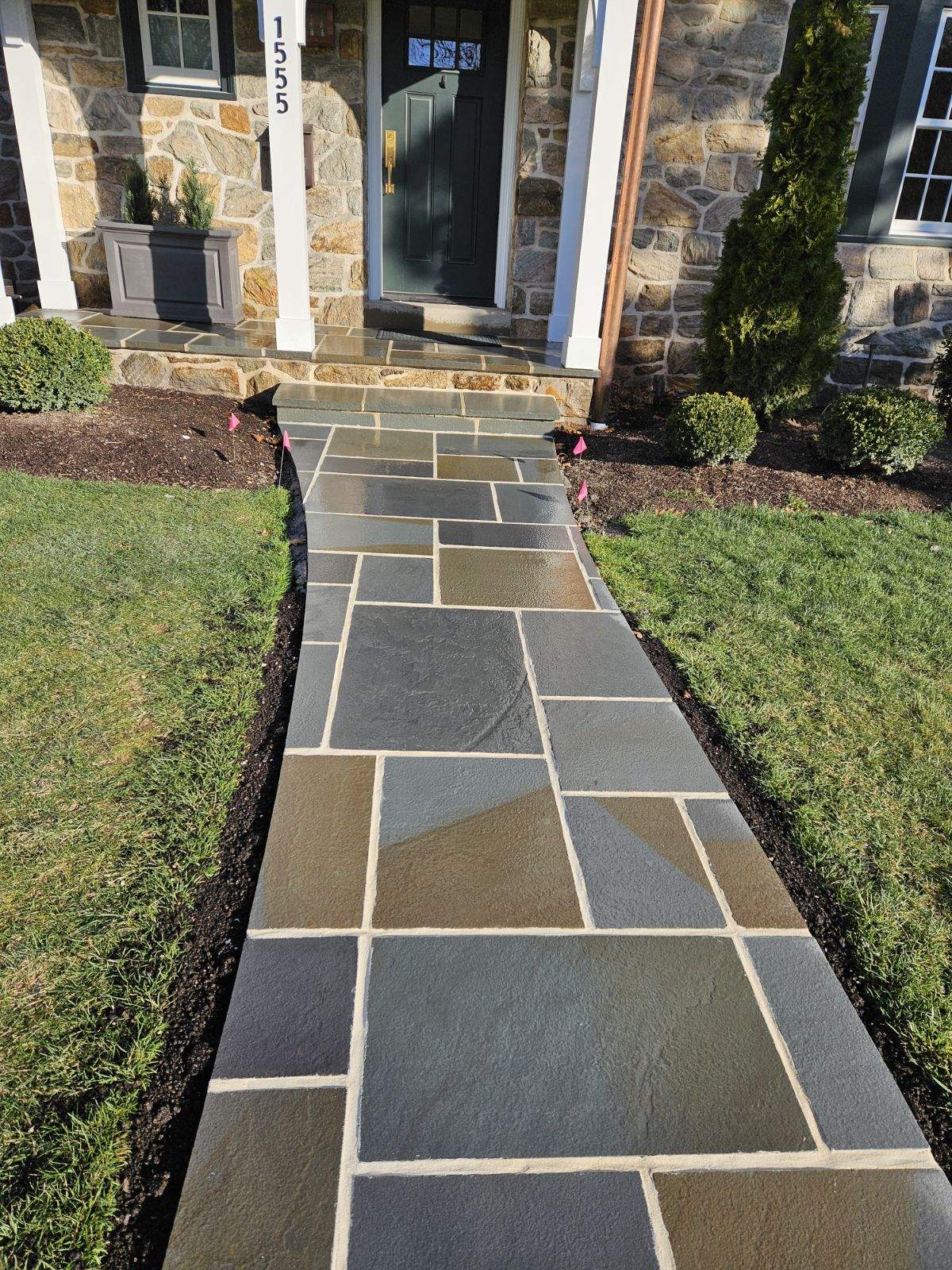 After: a new stone walkway was installed all the way to the road