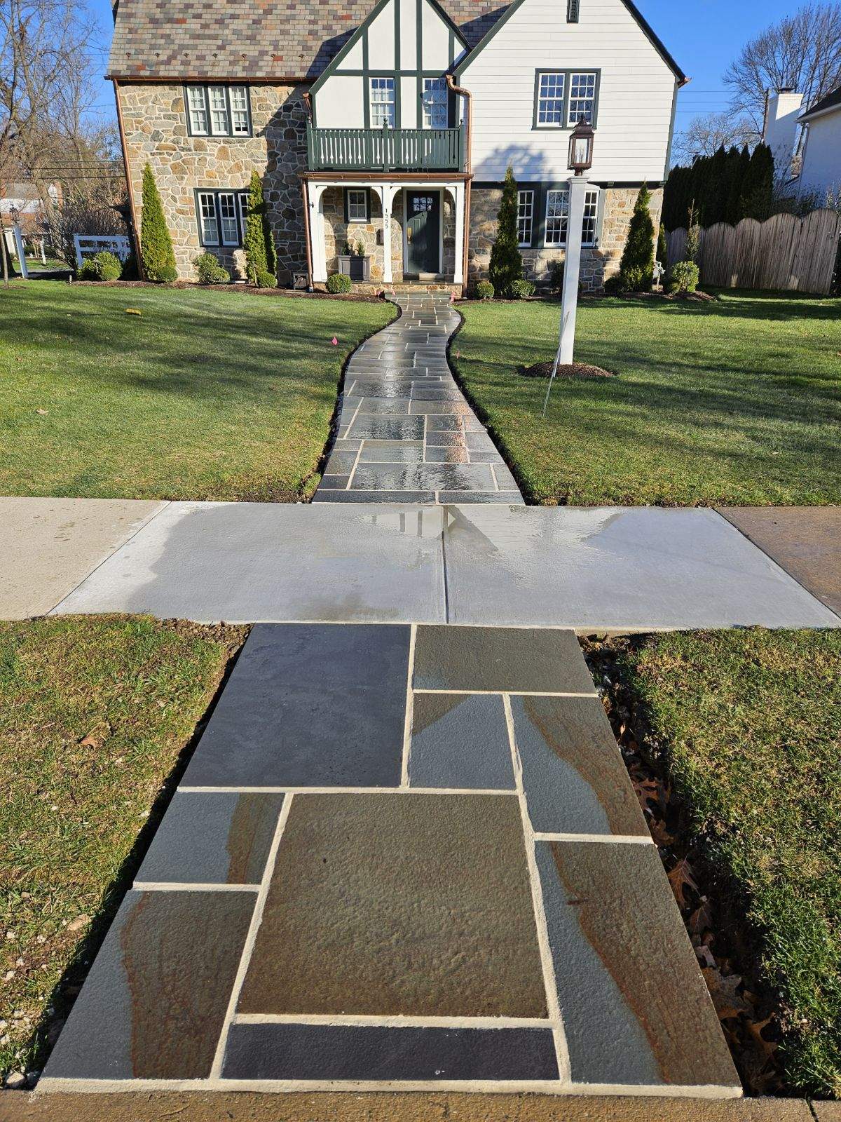 after a new stone walkway was installed all the way to the road