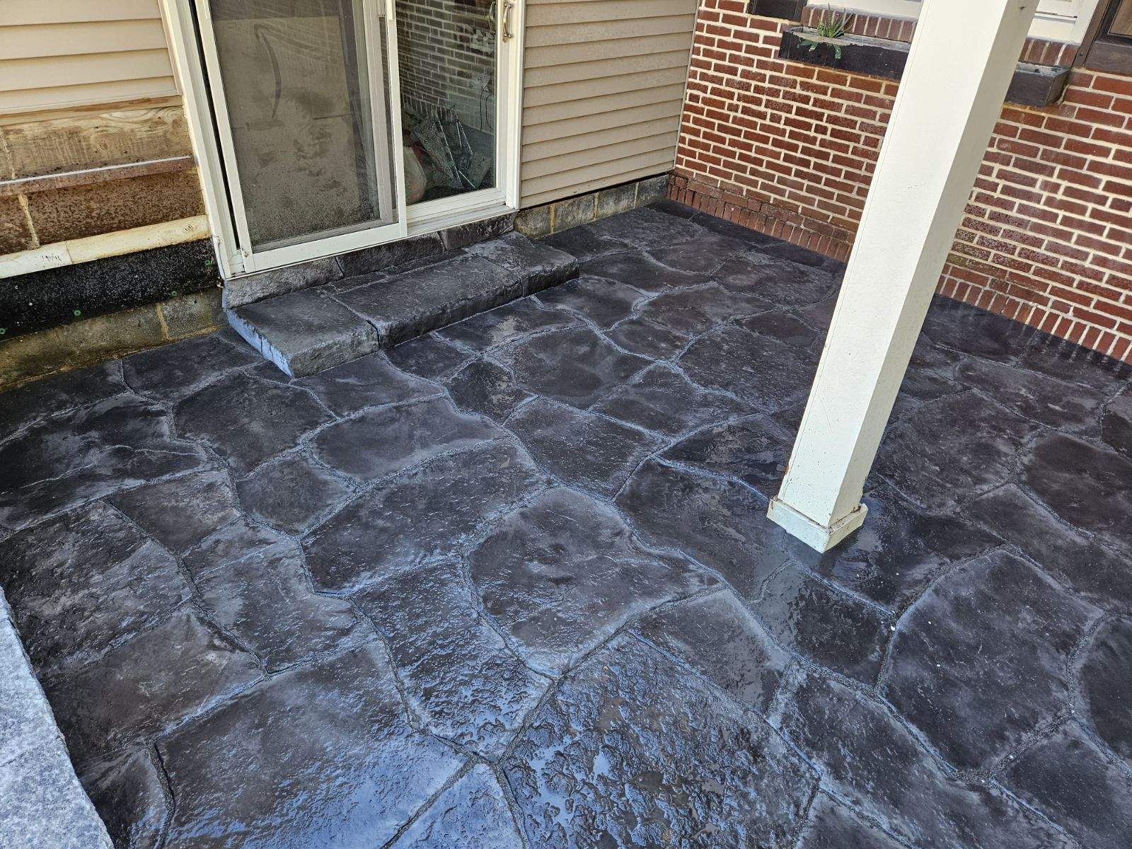 natural stone-patio-replacing parts of the wood deck and all the cement