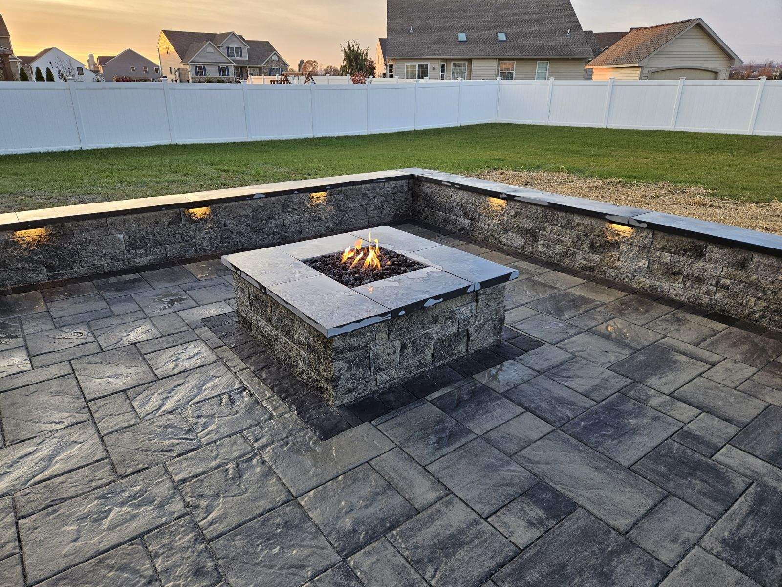 retaining walls and firepit built into patio